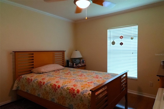 bedroom with crown molding, ceiling fan, and dark hardwood / wood-style flooring