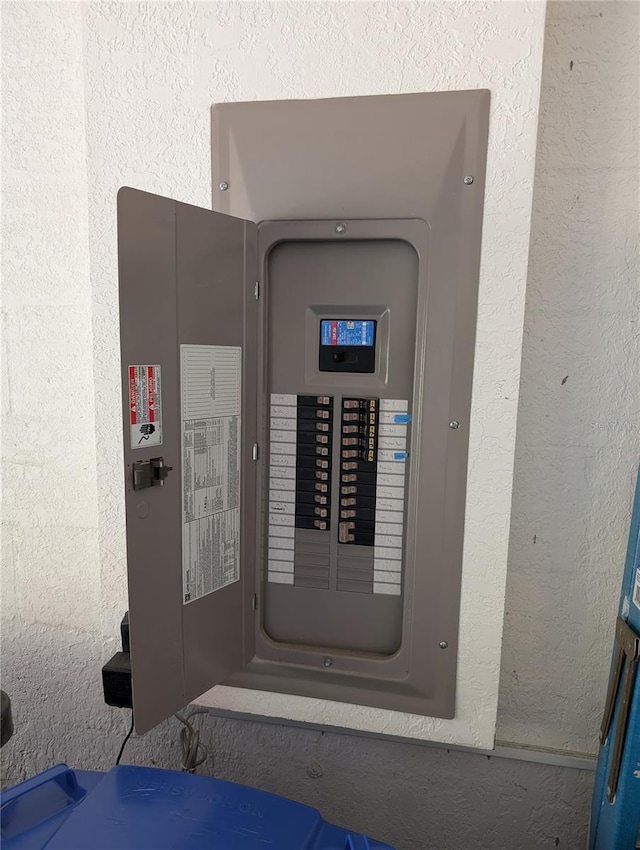 utility room featuring electric panel