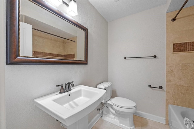 full bathroom with sink, bathing tub / shower combination, a textured ceiling, tile patterned floors, and toilet