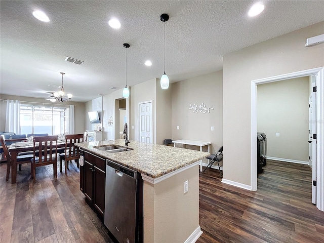 kitchen with dishwasher, a kitchen island with sink, hanging light fixtures, sink, and dark hardwood / wood-style flooring