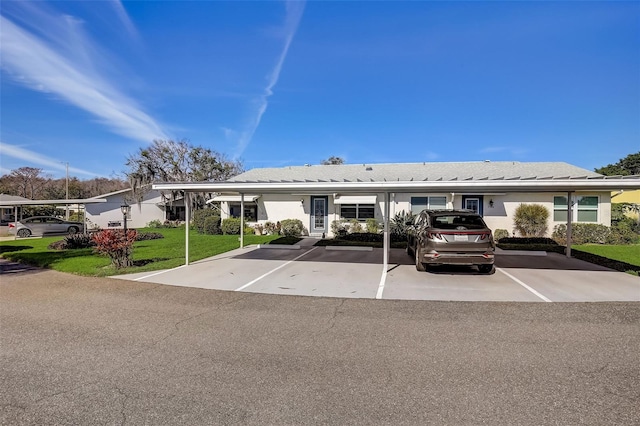 view of property featuring a carport