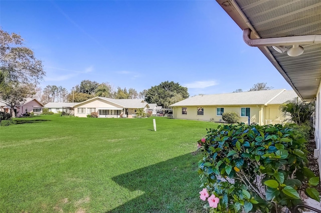 view of yard featuring a residential view