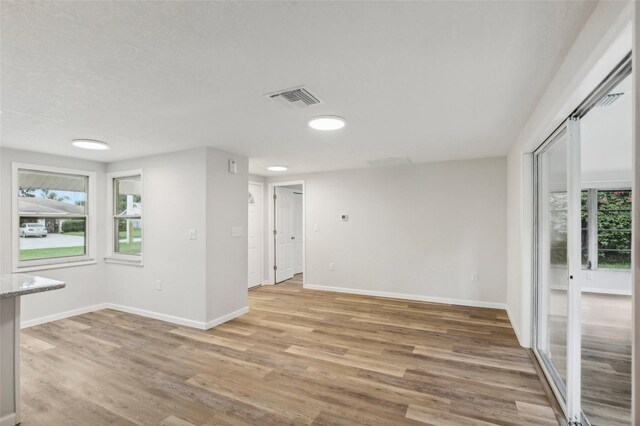 empty room with light wood-type flooring