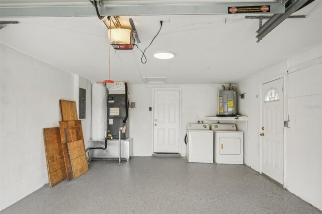 garage with water heater, a garage door opener, independent washer and dryer, electric panel, and heating unit