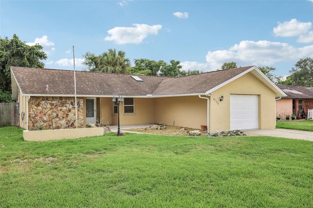 ranch-style home with a garage and a front yard