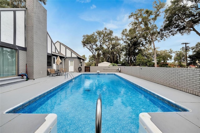 view of pool with a patio area