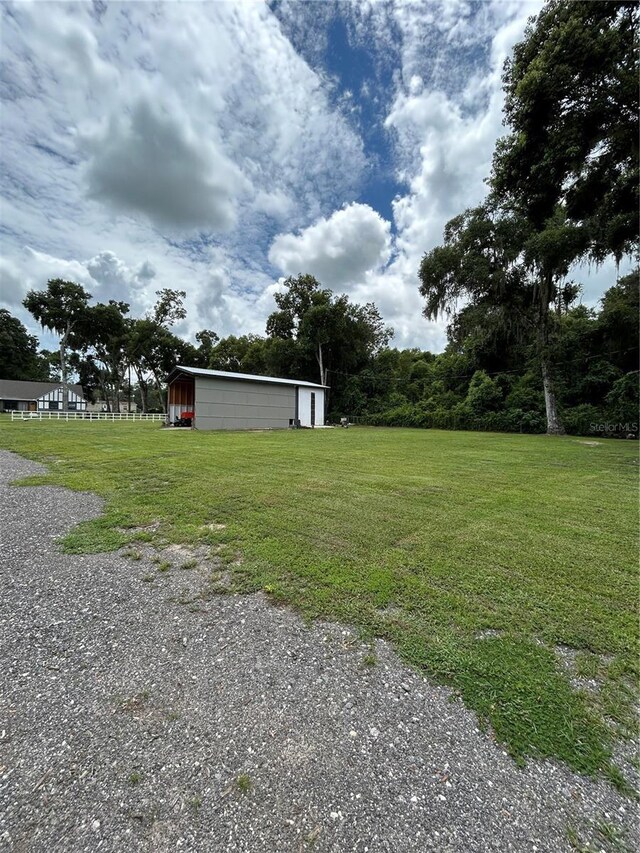 view of yard with a garage