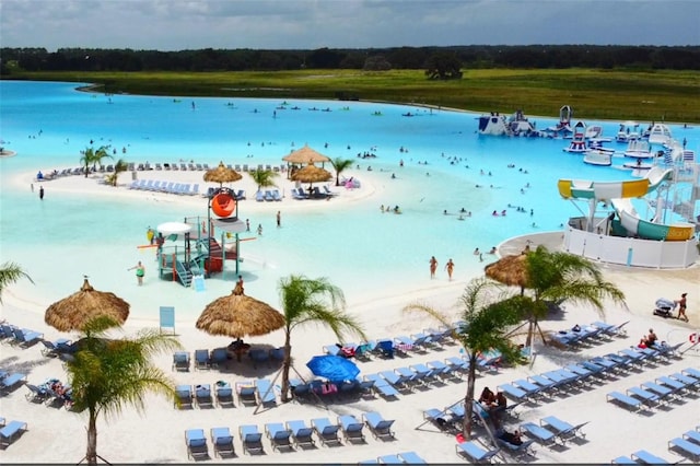 view of water feature with a beach view