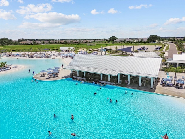 view of swimming pool with a patio