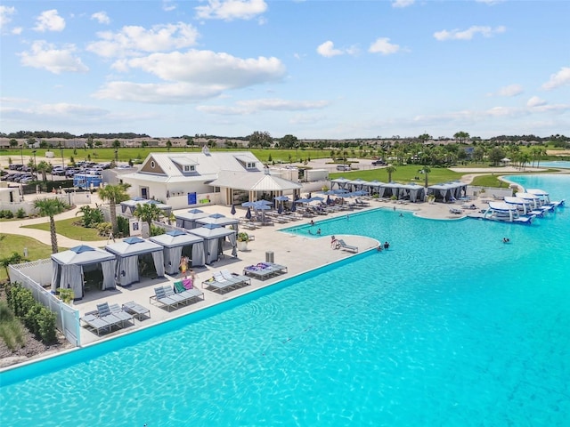 view of swimming pool with a patio