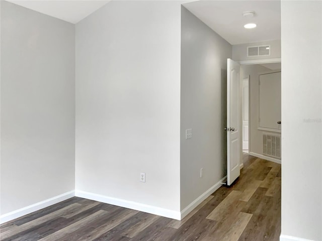 corridor featuring hardwood / wood-style floors