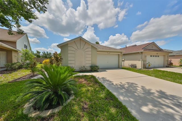 ranch-style house featuring a garage