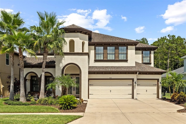 view of front of home with a garage