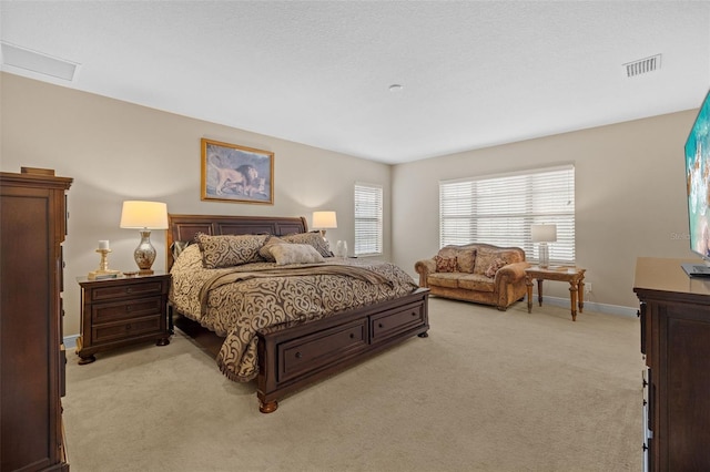 bedroom with light carpet