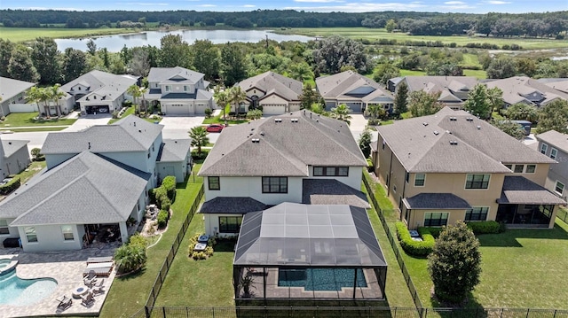 bird's eye view with a water view