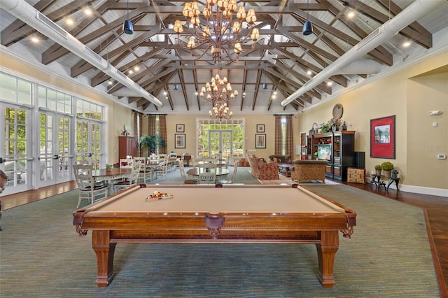 recreation room featuring pool table, beam ceiling, french doors, and a chandelier