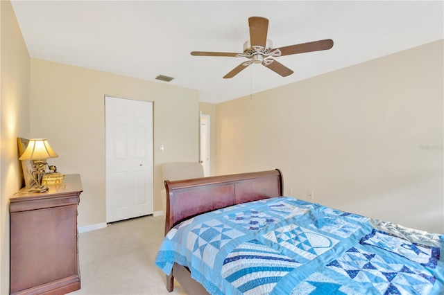 carpeted bedroom featuring ceiling fan