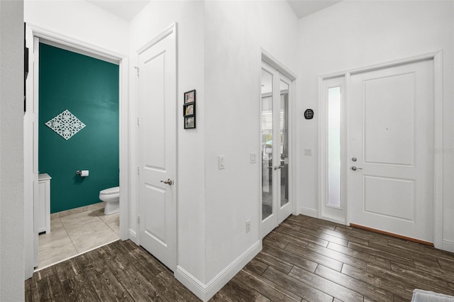 foyer featuring dark wood-type flooring