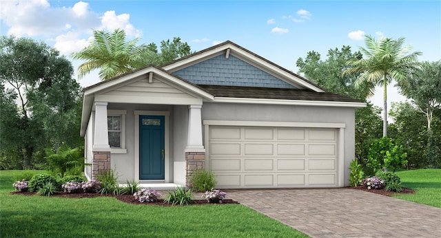 view of front facade with a garage and a front lawn