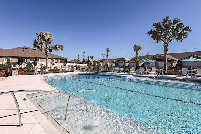 view of pool featuring a patio area