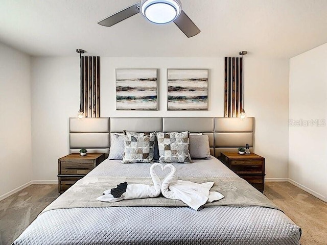 7472 Oakmoss Loop, Davenport, FL 33837 - carpeted bedroom featuring baseboards and a ceiling fan
