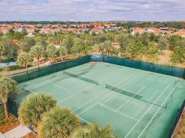 7472 Oakmoss Loop, Davenport, FL 33837 - view of tennis court featuring a residential view