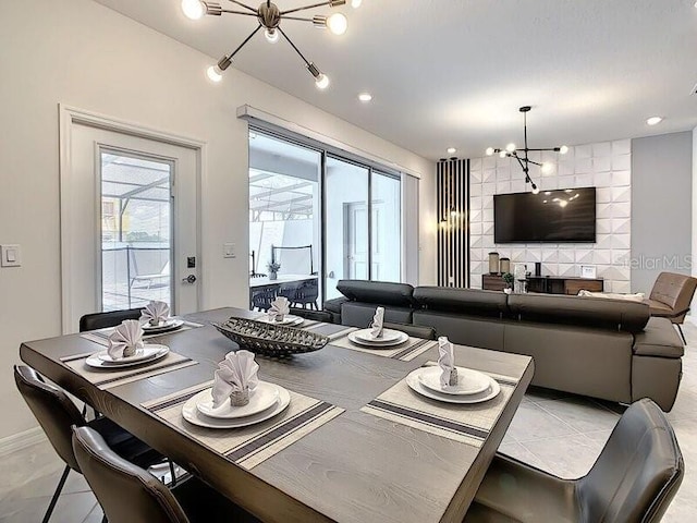 7472 Oakmoss Loop, Davenport, FL 33837 - dining space with a chandelier and baseboards