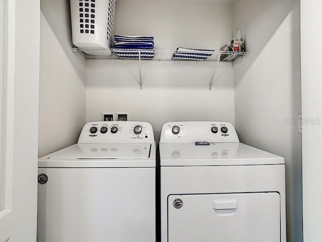 7472 Oakmoss Loop, Davenport, FL 33837 - washroom featuring separate washer and dryer