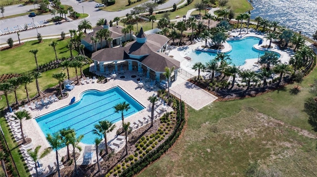 birds eye view of property featuring a water view