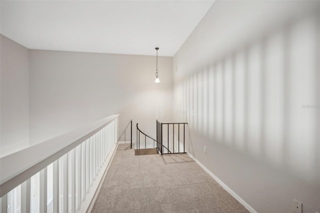 corridor featuring carpet floors