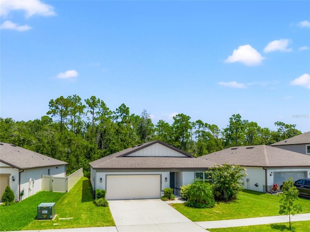 ranch-style home with a garage and a front yard