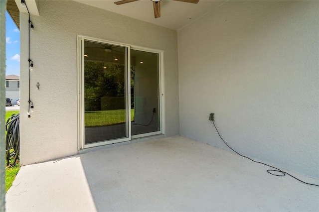 view of patio / terrace featuring ceiling fan