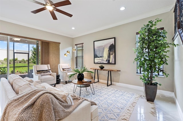 living room with crown molding, ceiling fan, and light tile patterned flooring