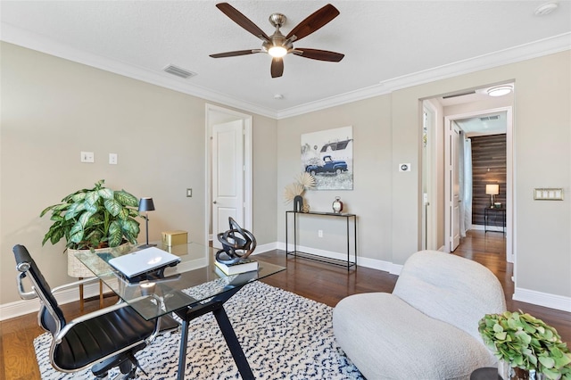 home office with ceiling fan, ornamental molding, and dark hardwood / wood-style floors