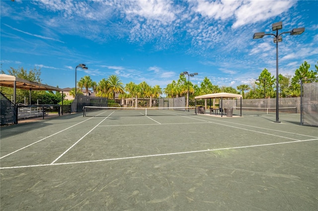 view of sport court with a gazebo