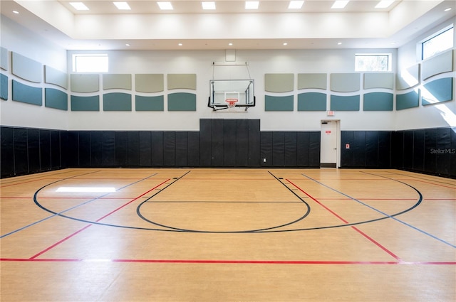 view of sport court featuring a wealth of natural light