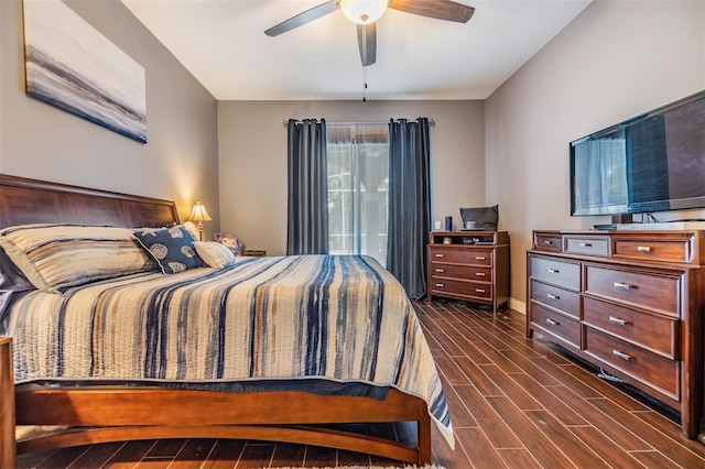 bedroom featuring dark hardwood / wood-style floors and ceiling fan