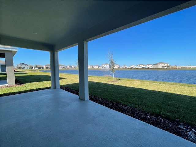 view of patio / terrace with a water view