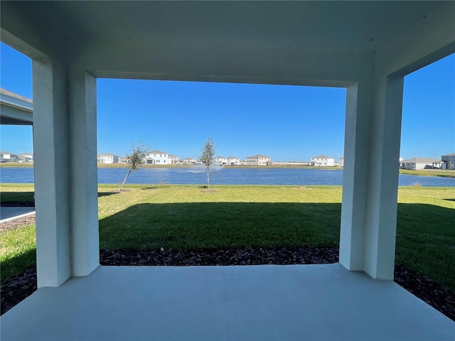 view of patio / terrace with a water view