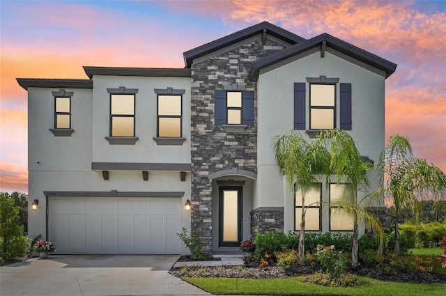 view of front of property with a garage