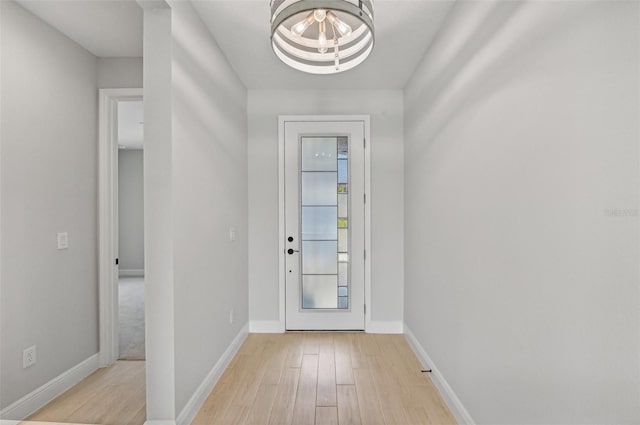 doorway to outside with light hardwood / wood-style flooring