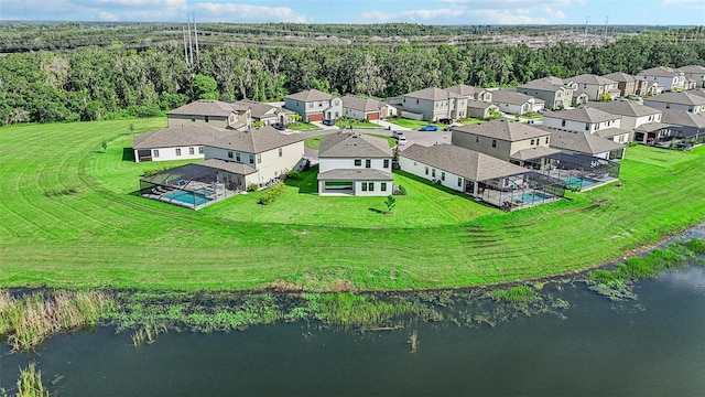 bird's eye view with a water view