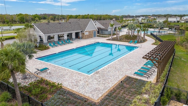 view of swimming pool with a patio area