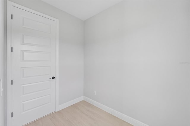 spare room with light wood-type flooring