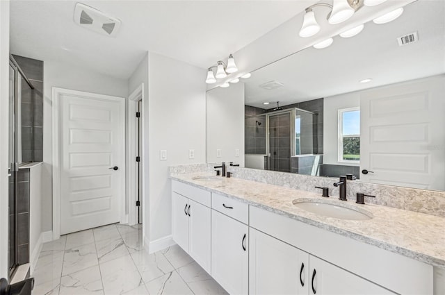 bathroom featuring vanity and walk in shower