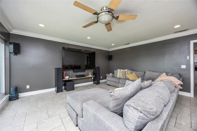 tiled living room featuring ceiling fan, ornamental molding, and a textured ceiling