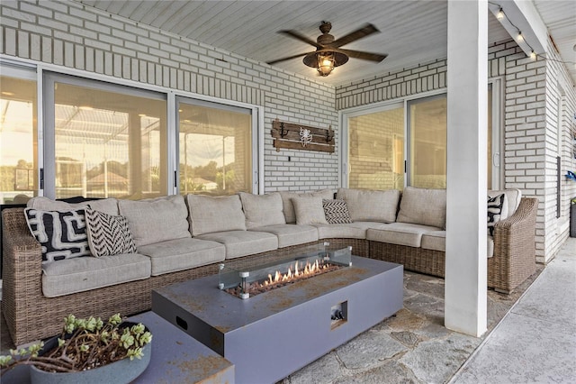 view of patio with an outdoor fire pit