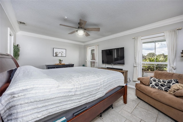 bedroom featuring a ceiling fan, visible vents, crown molding, and a textured ceiling