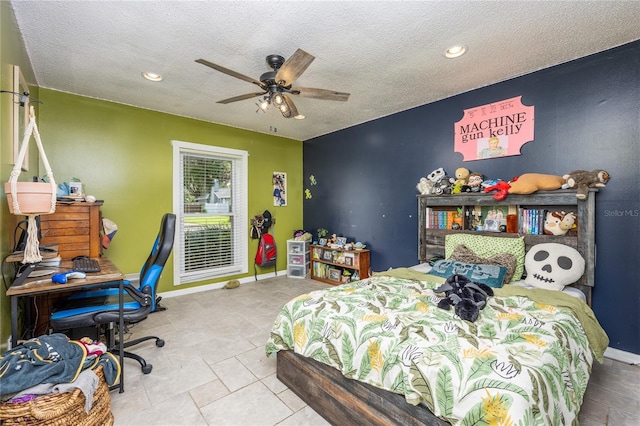 bedroom featuring recessed lighting, ceiling fan, a textured ceiling, and baseboards