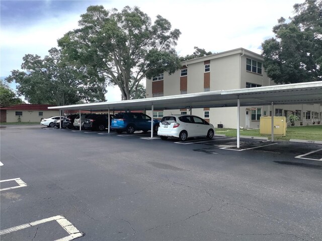 view of car parking featuring a carport